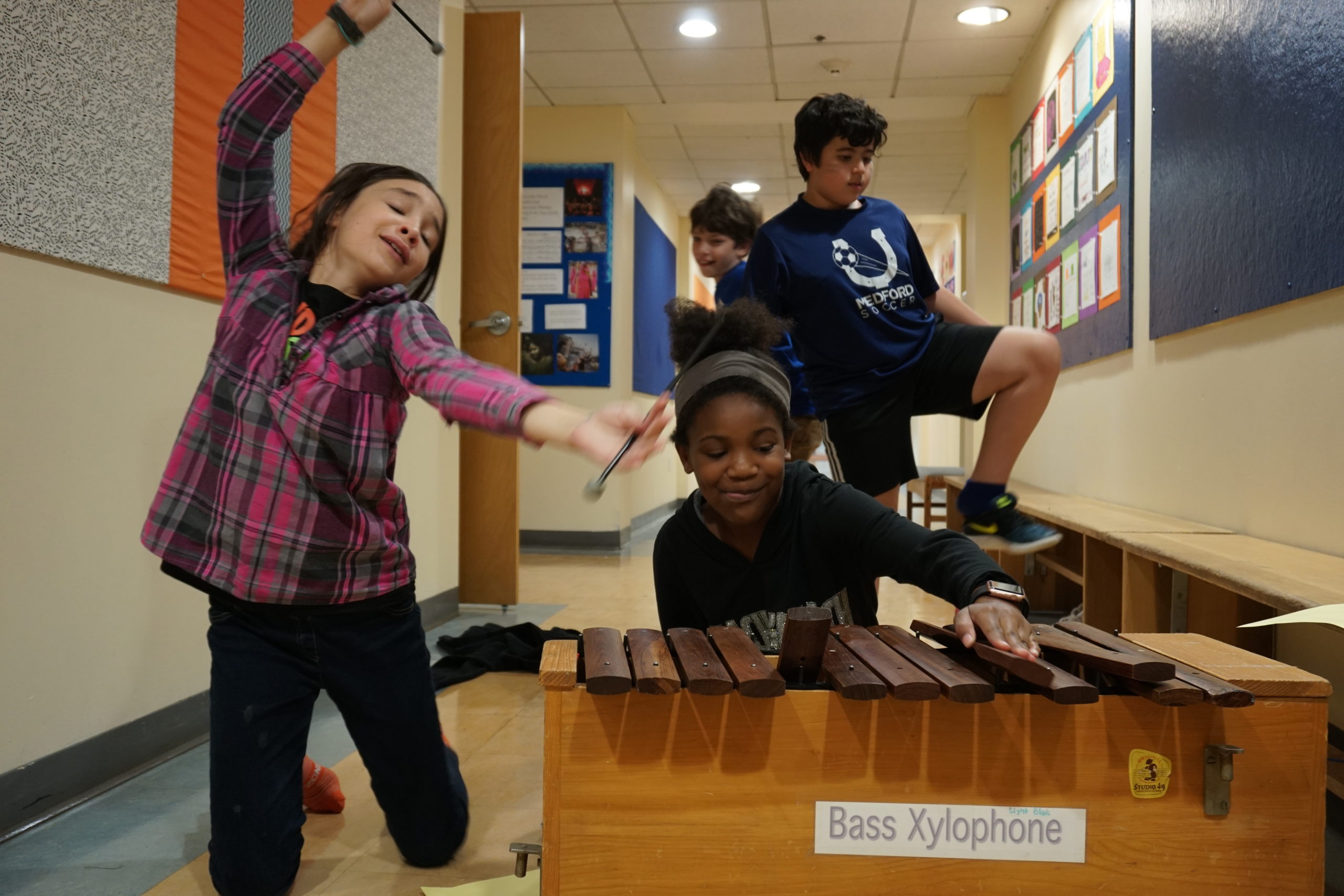 Students take part in instrumental music and dance at Cambridge Friends School in small breakout sessions.