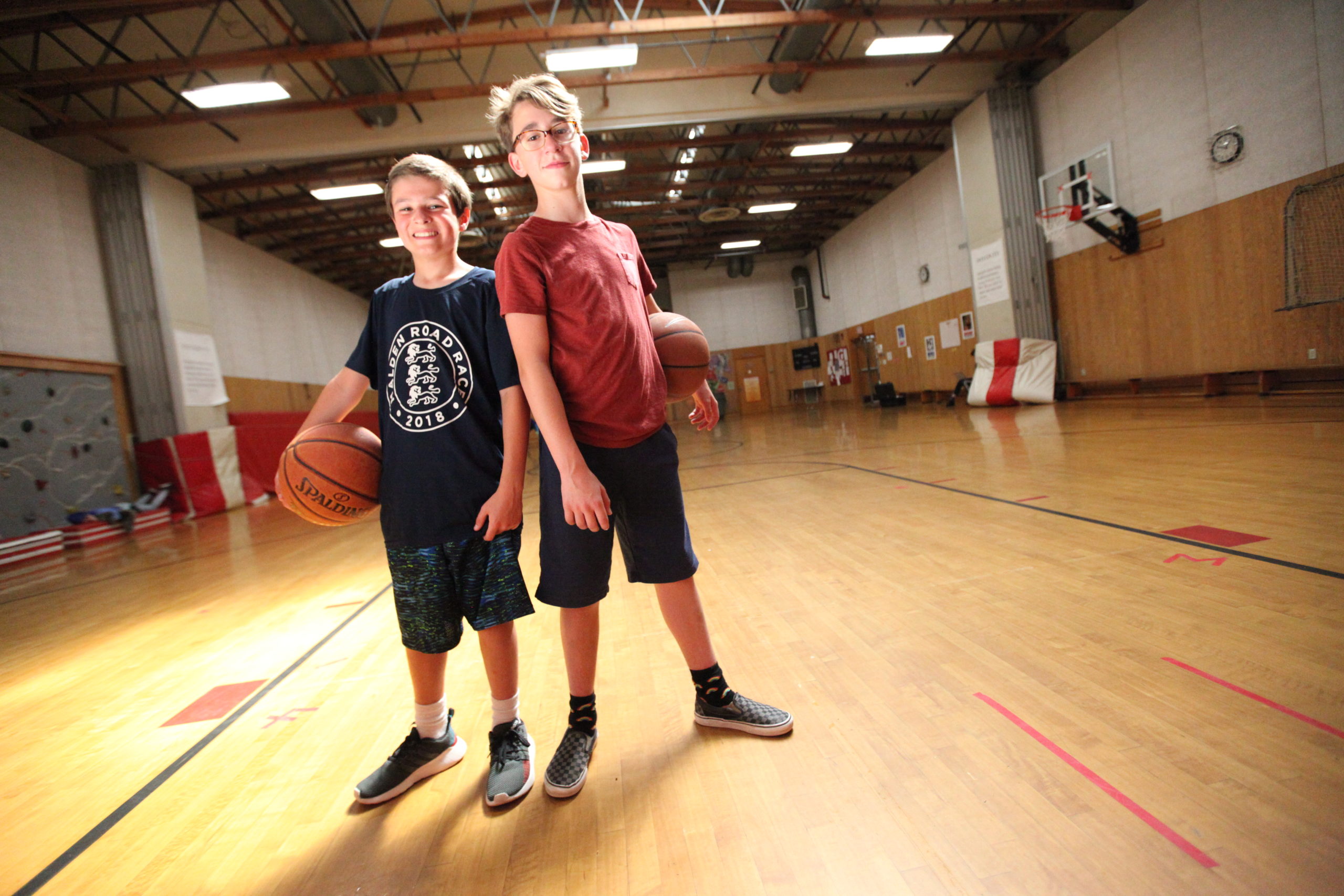 Middle School students pose during basketball in the Gymnasium at Cambridge Friends School