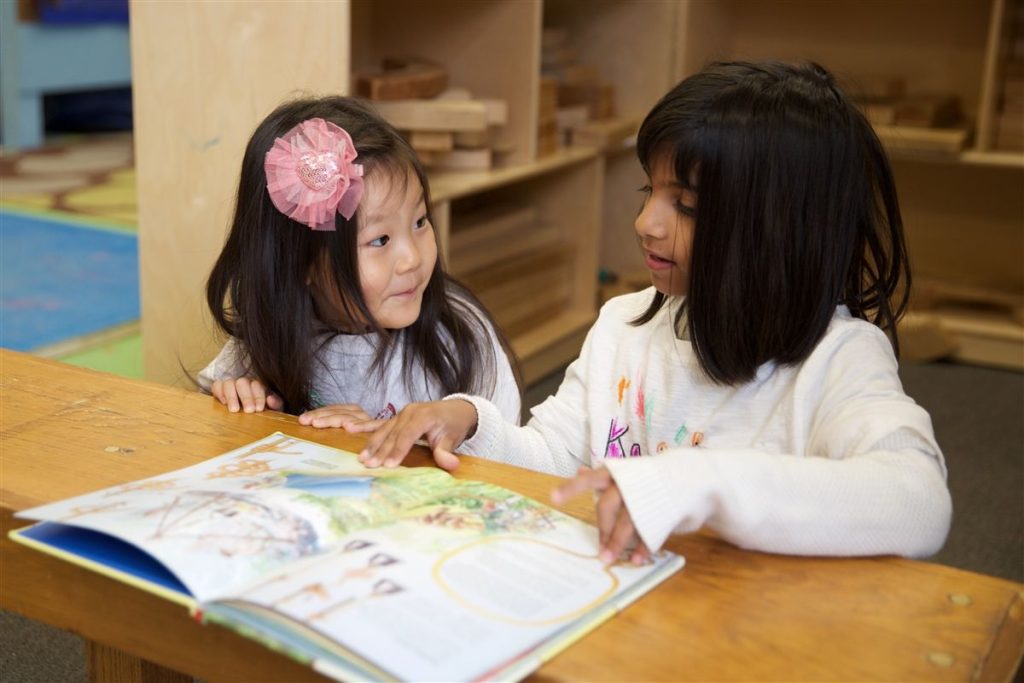 early childhood students read together